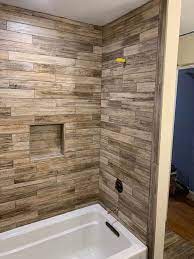 In the hallway bathroom, not only the walls were covered in the stuff, but the countertop, sink cabinet, and door back as well. Vinyl Flooring For Shower Walls Vinyl Flooring Online