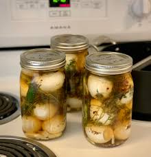 Had some extra eggs so I made spicy garlic dill (vinegar, salt, pickling  spice, dill, fresh garlic, red pepper flakes in brine. Halved Serranos and  jalapeños w/seeds, garlic and dill in the