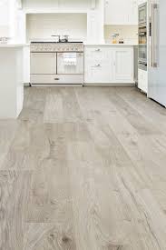 With Subtle Grey Tones And Extra Large Planks Vantage Wood 14mm Laminate Flooring Rock Oak Will Bring An Ele Grey Laminate Flooring Flooring Laminate Flooring