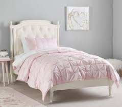 Nailhead trim lends a tailored touch, while foam padding provides a cushioned seat. Blythe Without Footboard Kids Bed Pottery Barn Kids