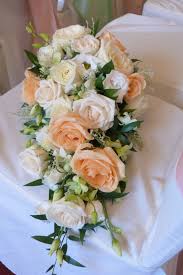 Shop with afterpay on eligible items. Trailing Bridal Bouquet Of Ivory And Peach Avalanche Roses Vendela Roses Lizianthus Freesia And M Vintage Wedding Flowers Wedding Bouquets Bridal Bouquet