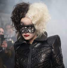 Emma stone, emma thompson, joel fry and others. Literally The Trashiest Costume From Cruella