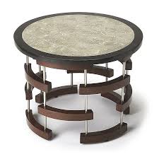 The table dramatically shows the 345 million year old sea life from the moroccan desert.these are a one of kind find that will enhance your homes décor. Butler Specialty Company Broken Arcs Fossil Stone Coffee Table Bed Bath Beyond