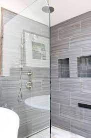 You might also like this photos or back to ideas for painted ceramic tile patterns. Big 12x24 Tiles In Shower Large Tile Bathroom Bathroom Shower Tile Gray Shower Tile