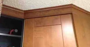 See how it is done. Diy Cove Ikea Adel Medium Brown Cabinets Brown Cabinets Ikea Adel Kitchen Cabinet Trim