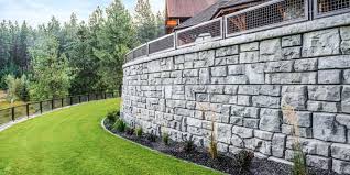 These walls use the concrete wall weight to resist pressure. Gravity Retaining Walls With Large Precast Modular Blocks Redi Rock