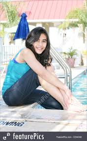 Pixta offers high quality stock photo at a low price. Young Teen Girl Sitting By Pool Image