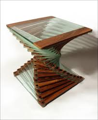The table also features a top, the most impressive part of the design. Surrey Woodsmiths Vinca