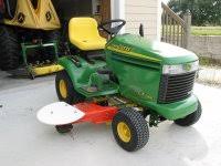 I have back problems that make running the evil gas powered weed whacker a real uncomfortable nuisance for me on a good day, and one day i expect the hoass to send me a snottygram about the weeds. Deck Mounted Weedeater Tractorbynet