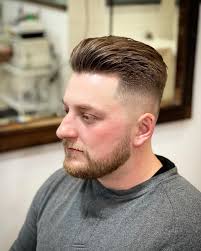 Stay effortlessly stylish with a messy top and a clean taper fade.  Perfectly balanced for a fresh, modern look. Book your cut today!  #taperfade #messystyle #barberlife . . . #haircut #hairgoals #hairstyle  #hairfashion #barber