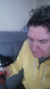 Mom enjoying a Valentine's day cupcake I made her, after I gave her a  haircut. , I included a second video of mom "talking" she no longer uses  word and more so makes noises like a baby with a few ...