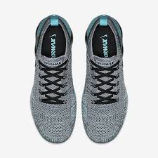 The air vapormax 2 'hot punch' features an interwoven black and white breathable flyknit upper with hot punch accents on the swoosh branding, dusty cactus detailing along the perforated heel and heel pull tabs, and a purple translucent vapormax air unit on the sole for added support and protection. Nike Air Vapormax 2 0 Flyknit Dusty Cactus Grailify