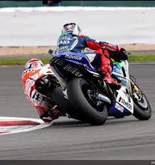 Marc Marquez And Jorge Lorenzo Getting A Little Close Together At Silverstone 2014 Motogp Motogp Race Bike Racers