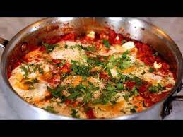 Shakshuka Recipe A Traditional Baked Egg Dish Melissa Clark Youtube Shakshuka With Feta Recipe Shakshuka Recipes Feta Recipes