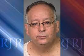 Mack Middle School teacher's assistant arrested