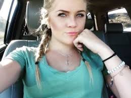 Cheerleader charged in homeless man's murder