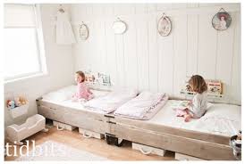 Try These 25 Ways To Carve Out A Bedroom In Your Studio Apartment Shared Girls Bedroom Kids Rooms Shared Girls Bedroom Makeover