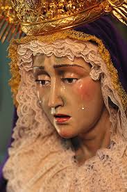 Close-up of a statue of the Virgin Mary, …
