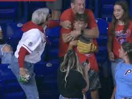phillies karen takes ball: Viral video: Phillies Fan sparks outrage after snatching  home run ball from young boy, internet blasts her as 'Karen' - The Economic  Times