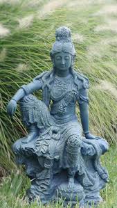 The headdress and the pot the buddha holds in his right hand identify him as the bodhisattva avalokiteshvara (known in chinese as guanyin or kwan yin). Garden Kwan Yin Statue Kuan Yin Statue Kuan Yin Statue