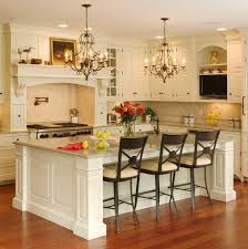 Another french country kitchen element comes from the kitchen island and the antique, black cupboard. French Country Kitchen Lighting Decoomo