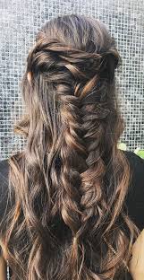 If the bride is styling her hair down in a fishtail braid, then the bridesmaids can copy a similar look with their hair loose and to the side with a small plait. 33 Romantic Half Up Half Down Hairstyles Boho Twist Braid