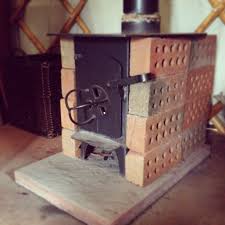 A Bunch Of Bricks Around A Regular Metal Stove Wood Burning Stoves Forum At Permies Wood Burning Stove Stove Home Rocket