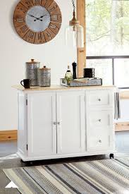 Withurst White Light Brown Kitchen Cart Take The Guesswork Out Of Entertaining With The Withurst Kit Ashley Furniture Industries Room Signature Design Ashley