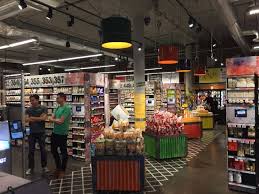 Organic Garage Flagship Store By Api Toronto Canada Supermarket Design Grocery Store Design Food Retail