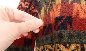 A thin mohair yarn blends nicely when used to repair a fuzzy sweater. How To Fix A Snagged Thread In Your Favorite Sweater Fashion Wonderhowto