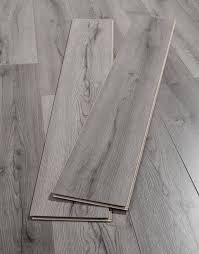 If your remodeling project or new construction calls for the look and feel of traditional hardwoods, then your. Loft Dark Grey Laminate Flooring Grey Laminate Flooring Grey Wood Floors Dark Grey Laminate Flooring