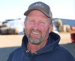 A young couple's South Dakota custom hog finishing barn is part of a  livestock 'uptick' in Clark County