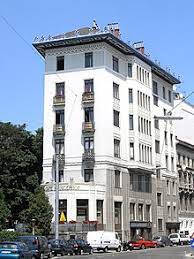 Ten minutes later, we found ourselves on the leafy terrace of café rüdigerhof, where the day's newspapers hung from a refashioned coat stand. Rudigerhof
