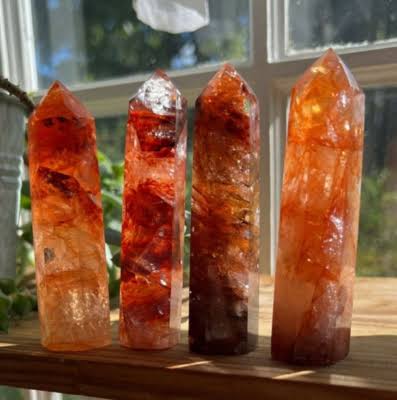Polished Fire Quartz Crystal Towers, AI generated