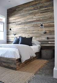 scandinavinsch licht wit zwart grijs hout natuurlijke materialen slaapkamer met betonvloer met sisalkl slaapkamerideeen bedombouw slaapkamer achterwand