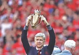 Arsenal's 'invincibles' from 2003/2004 were given the trophy with their win/loss record engraved on it. Wenger Awarded Invincibles Trophy The Daily Star