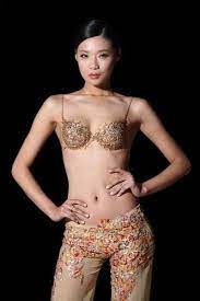 Check out our gold bra selection for the very best in unique or custom, handmade pieces from our costumes shops. Gold Bras