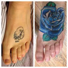 A quote in black ink. Cover Up Foot Tattoos Roses Tattoo