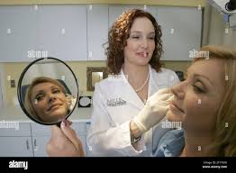 Dr. Leslie Baumann gives a botox shot to patient Valentina Hubsch