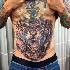 Stomach tattoos,stomach tattoo design,stomache tattoos,big stomach tattoos,stomach tattoos for black men,male torso tattoo,pelvic tattoos for guys,abdominal tattoo,torso tattoos for men,stomack tatoos,stomach lettering tattoos,large stomach tattoos. 150 Stomach Tattoos That Will Help Make A Bold Style Statement Wild Tattoo Art