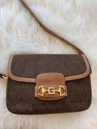 Maybe you would like to learn more about one of these? Vintage Gucci Cognac Brown Leather Micro Gg 1955 Crossbody Etsy