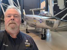 NASA research pilot Milt Thompson sits in the M2-F2 lifting body research  vehicle before a 1966 test flight. The M2-F2 was attached to a wing pylon 