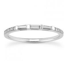 Tapered Baguettes And Round Shape Diamond Wedding Band Baguette Wedding Band Diamond Wedding Bands Wedding Bands