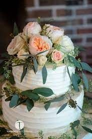 Geometric corners of a square wedding cake look so unusual together with tender flowers! Pin By Weddings With Serenity On Details We Love Publix Wedding Cake Wedding Cakes With Flowers Wedding Shower Favors Diy