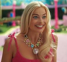 margot robbie wearing custom chanel spring 1995 necklace in barbie