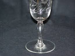 The wonderfully shaped stem and floral pattern in a very sheer glass. Vintage Wine Glass Etched Floral Pattern And 50 Similar Items