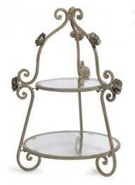 This wrought iron plate stand has many uses! Pin On Furnishings