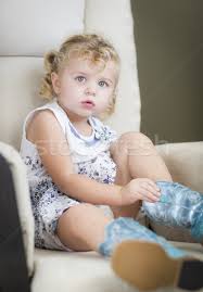 That girl spat in my eye. Blonde Haired Blue Eyed Little Girl Putting On Cowboy Boots Stock Photo C Feverpitch 4736626 Stockfresh