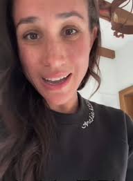 Meghan's sweater is embroidered with Archie & Lili's names!