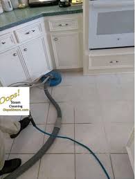 to clean grout between floor tiles